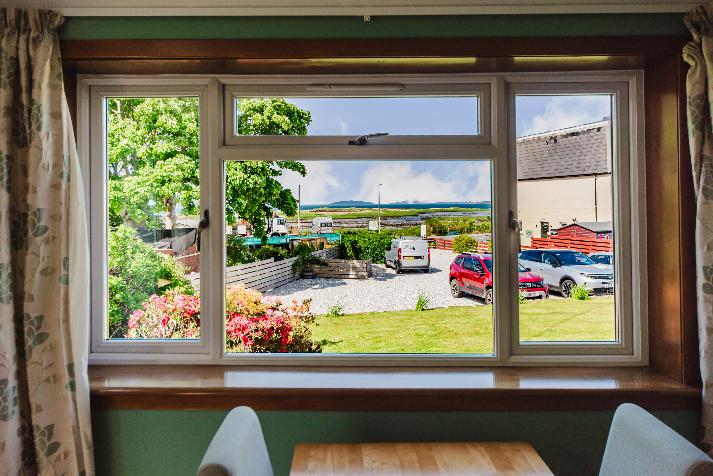 Sea view from a bedroom window at Otter Lodge